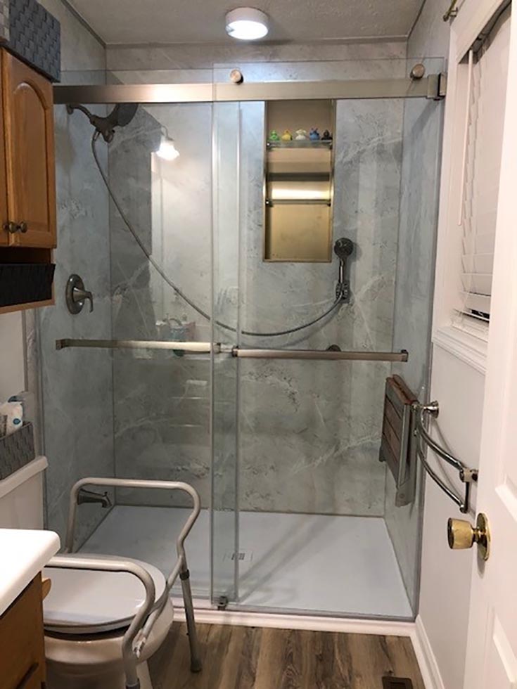 Section 1 reason 8 stone low profile shower pan white marble wall panels | Innovate Building Solutions | bathroom remodeling | Shower tile base | Shower design ideas